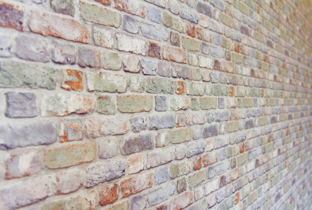 Ornamental brick wall forms part of interior stock photo