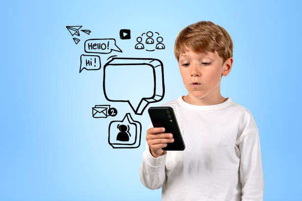 istock Boy using smartphone with copy space text bubble and social media doodle 1471726118