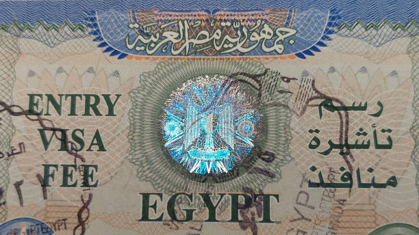 istock Egyptian visa in passport close-up. 1471726188