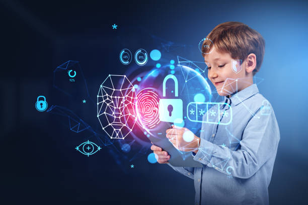 istock Kid boy working with tablet, digital hologram with face id and privacy 1471726493