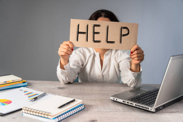 istock Tired woman with help inscription 1471726709