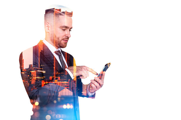istock Businessman with smartphone in hand, skyscrapers and copy space 1471728547