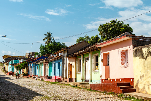 Cobblestone street with old colonial houses in the center of Trinidad, Cuba, Caribbean