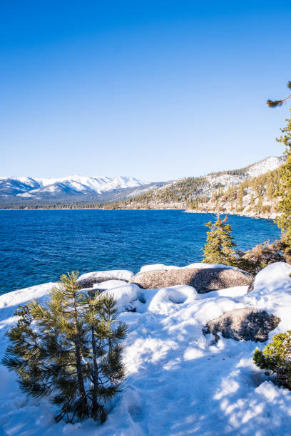 Views of Lake Tahoe from along the Tahoe East Shore Trail, part of the Lake Tahoe Nevada State Park during a snowy February.