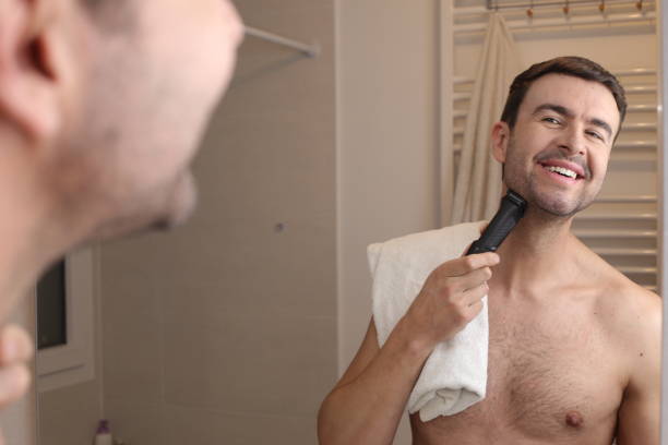 istock Man shaving in front of the mirror 1471733071