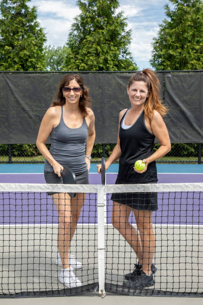 istock Two pickleball players posing at the net 1471733454