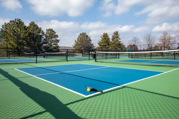 istock Pickleball Court Complex with Paddle and Ball 1471733471