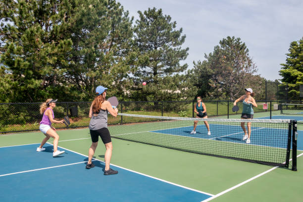 istock Pickleball Players in Action at Net 1471733514
