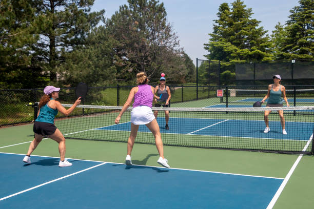 istock Pickleball Players in Action at Net 1471733523