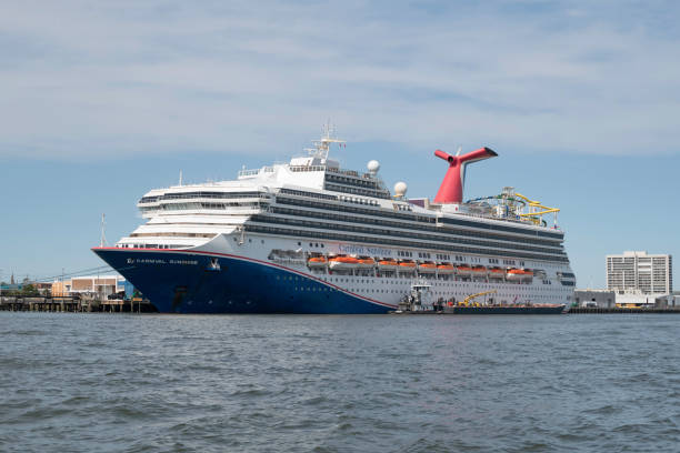 Carnival Sunshine Charleston, SC, USA - March 04, 2023: Sunshine, a 272-meter cruise ship owned and operated by Carnival Cruise Lines with a capacity for 3,758 passengers, moored at the Port of Charleston. carnival sunshine stock pictures, royalty-free photos & images