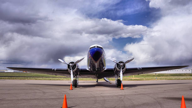 istock Old DC3 Airplane Parked at an Airport 1471734046