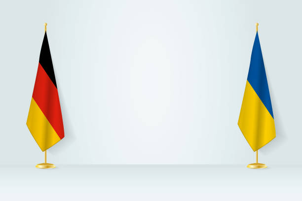 istock Germany and Ukraine flag on indoor flagpole, meeting concept between Ukraine and Germany. 1471735632