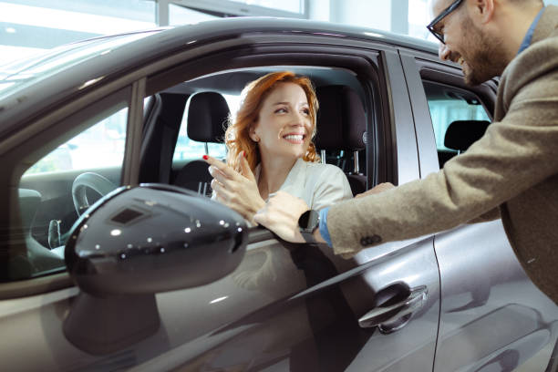 istock Couple buying their new car 1471735789