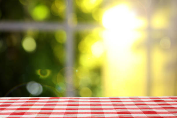 istock Table with red checkered cloth indoors. Space for design 1471736204