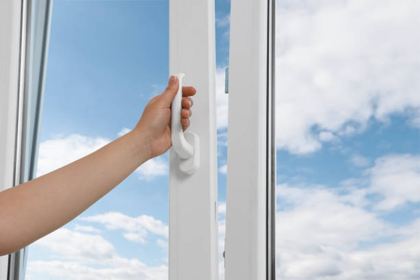 istock Woman opening white plastic window at home, closeup 1471737043