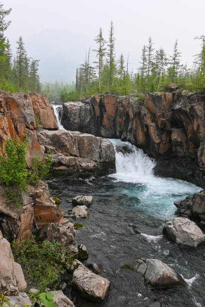 istock Waterfall on the Putorana Plateau. 1471741591