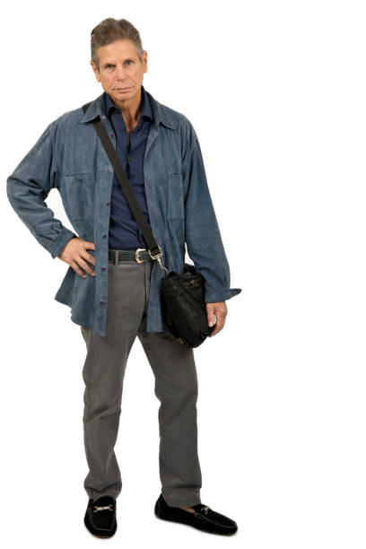 Well dressed middle aged man isolated on white background.