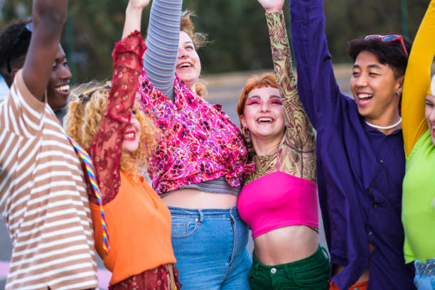 istock Group of young people of different ethnicities celebrating 1471743241