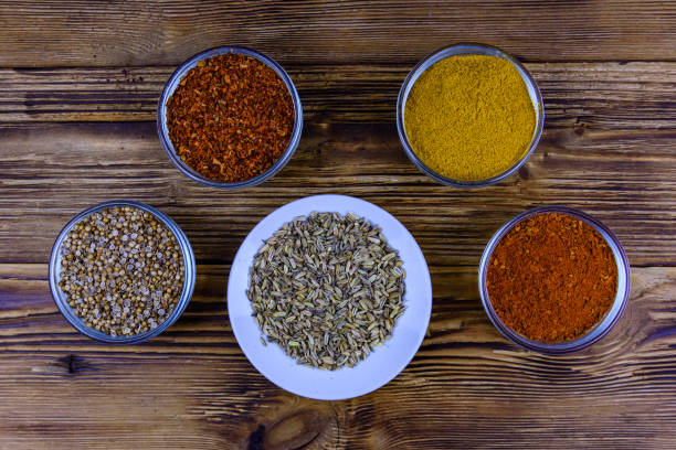 istock Bowls with oriental spices on a wooden table 1471744389