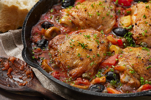 Italian Braised Chicken Thigh Cacciatore with Olives, Onions, Red Peppers, Tomatoes and Linguini