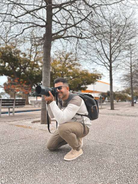 istock Photographer working outdoors 1471748896