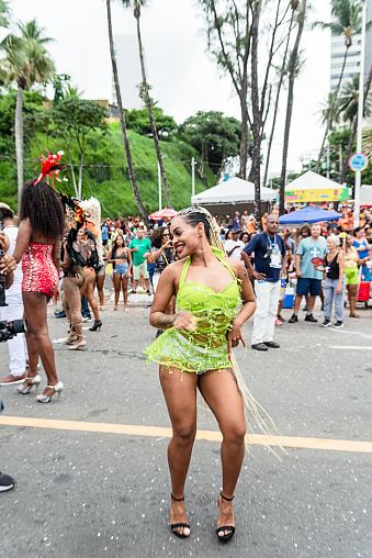 Salvador, Bahia, Brazil - February 11, 2023: Woman dances samba in the carnival parade called Fuzue, in the city of Salvador, Bahia.
