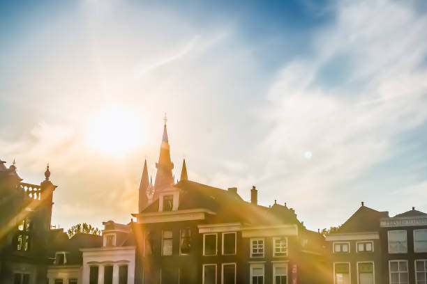 Delft, the Netherlands - April 2021: Sunny day at the market square in  city centre of Delft.