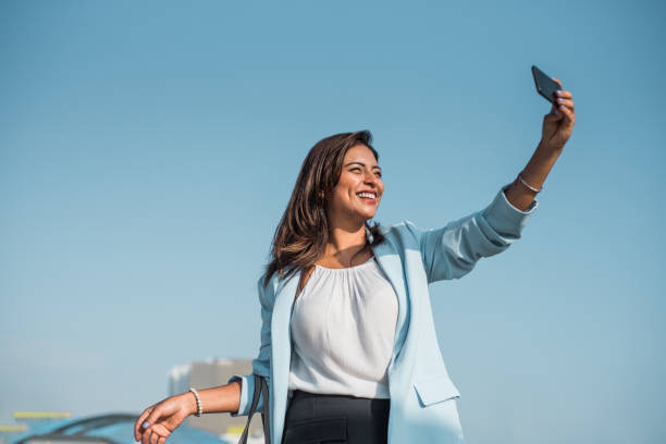 istock Business woman taking a selfie 1471757766