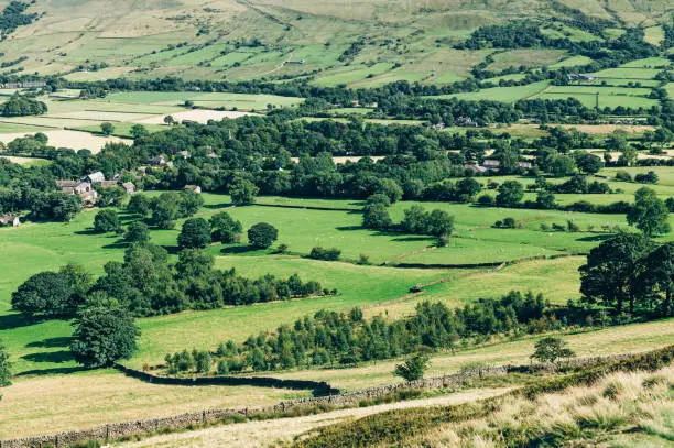 Beautiful field view on Edale village and Mam Tor at Peak District National Park, England, UK. Staycation concept of traveling local