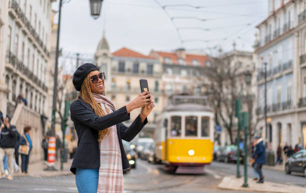 istock Woman taking a selfie in Lisbon 1471765036