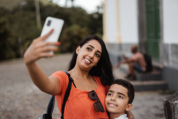 istock Mother and son taking a selfie 1471771715
