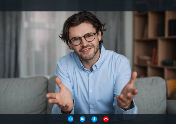 istock Friendly confident young european guy doctor psychologist gesturing with his hands 1471775131