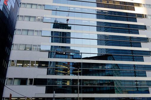 Reflection on glass, modern office buildings in the city