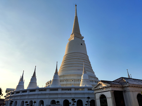 White stupa at Wat Prayurawongsawat Worawihan, known as Wat Prayun, a 19th century Buddhist temple complex in Thon Buri district, Bangkok, Thailand