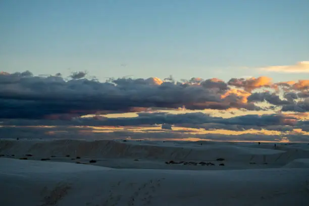 White Sands National Park Beautiful Sunset with Clouds and Grass and Buildings and FORD pickup truck