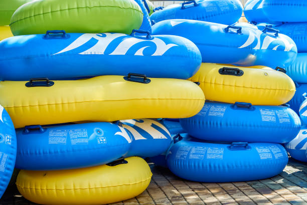 istock Multi-colored rubber rings for swimming pool put in rows 1471795180
