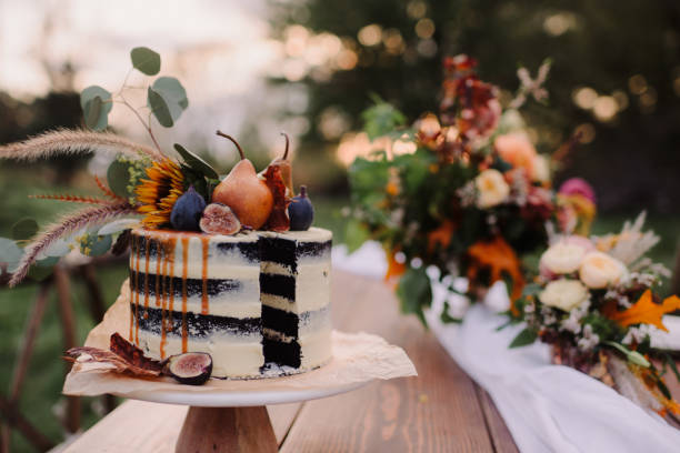 istock Wedding cake with a slice cut out 1471797925