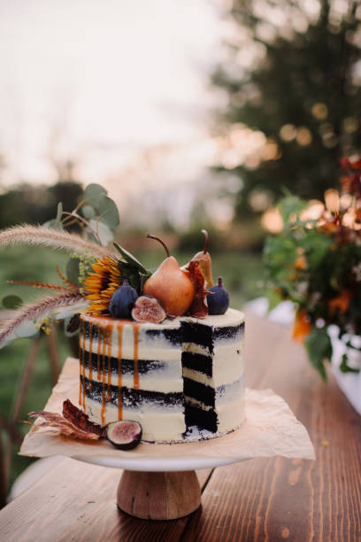 istock Wedding cake with a slice cut out 1471797928