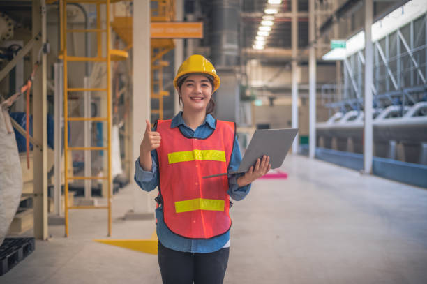 istock Asian woman Engineer using computer working in factory 1471798523