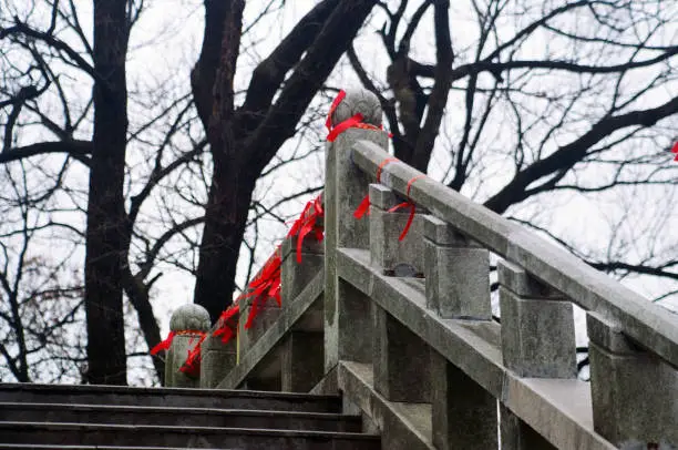 Guardrails tied with red ropes in a Chinese temple