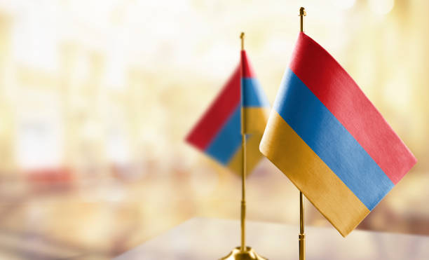 istock Small flags of the Armenia on an abstract blurry background 1471801609