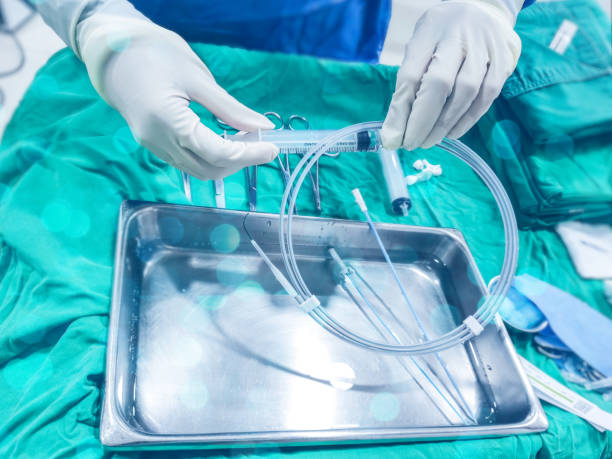 The nurse prepare guidewire for Medical material for surgical intervention packaging and sterile stock photo