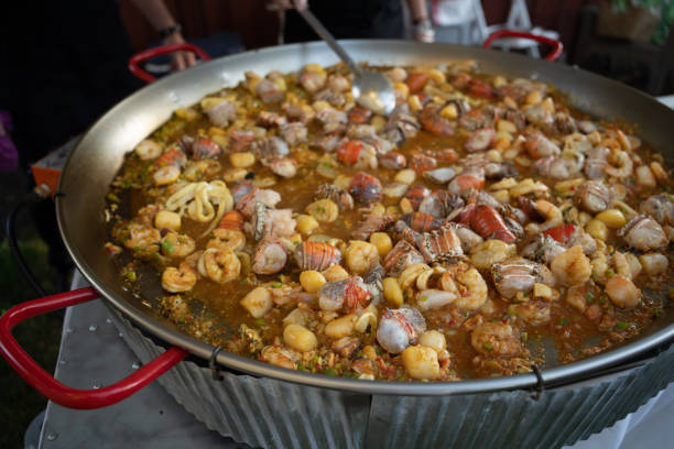 istock Cooking Spanish Paella during a party 1471804981