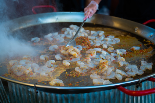 Cooking seafood Spanish Paella