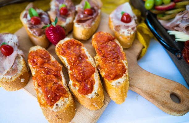 Canapes for party - bread with cherry tomatoes