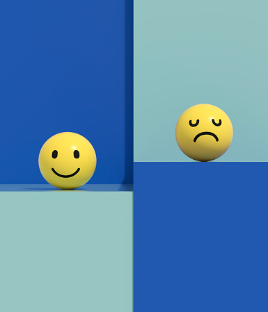 3d rendering of emoji with smiley and sad face on podium.