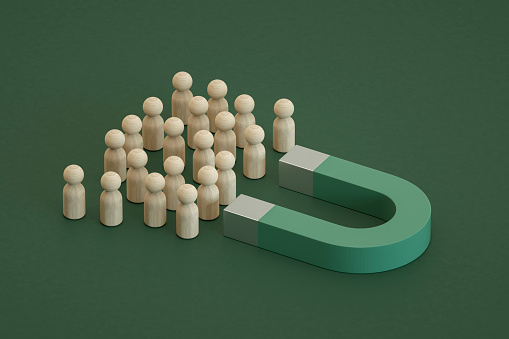 3D Rendering Of Magnet with Group of Pawn People.