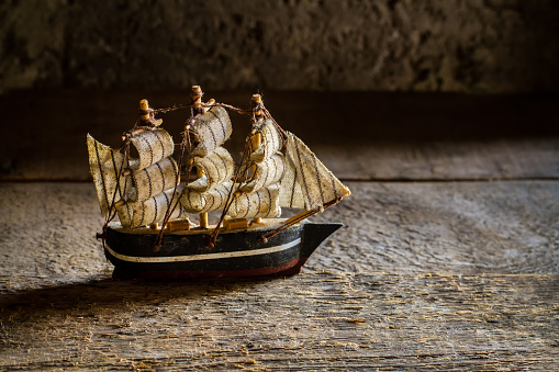 Wooden model of a sailing ship.
