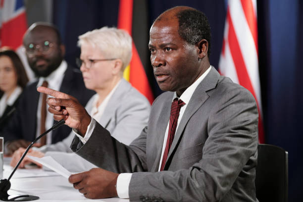 istock Confident mature African American delegate pronouncing speech 1471814622