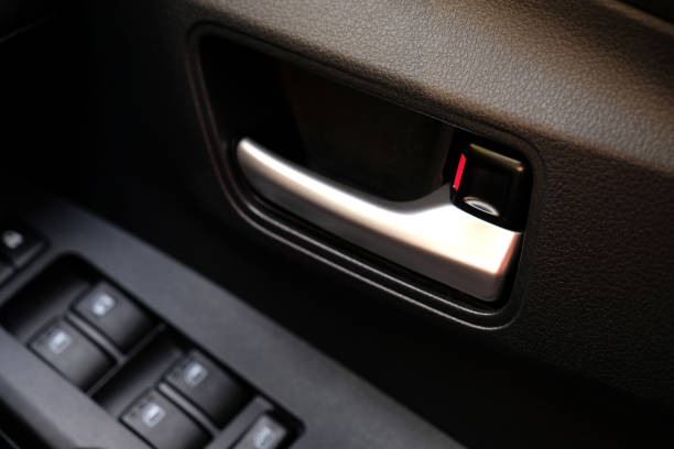 istock Car door handle. Car door inside with door handle. close-up view 1471814936